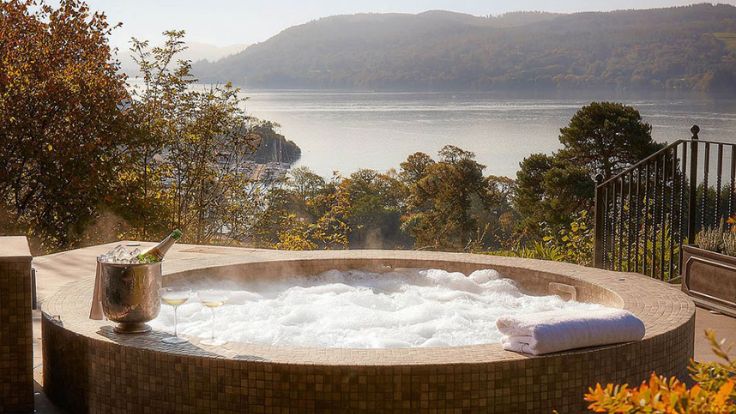 It's hard to beat the view from the hotel's private woodland hot tub (© The Samling)