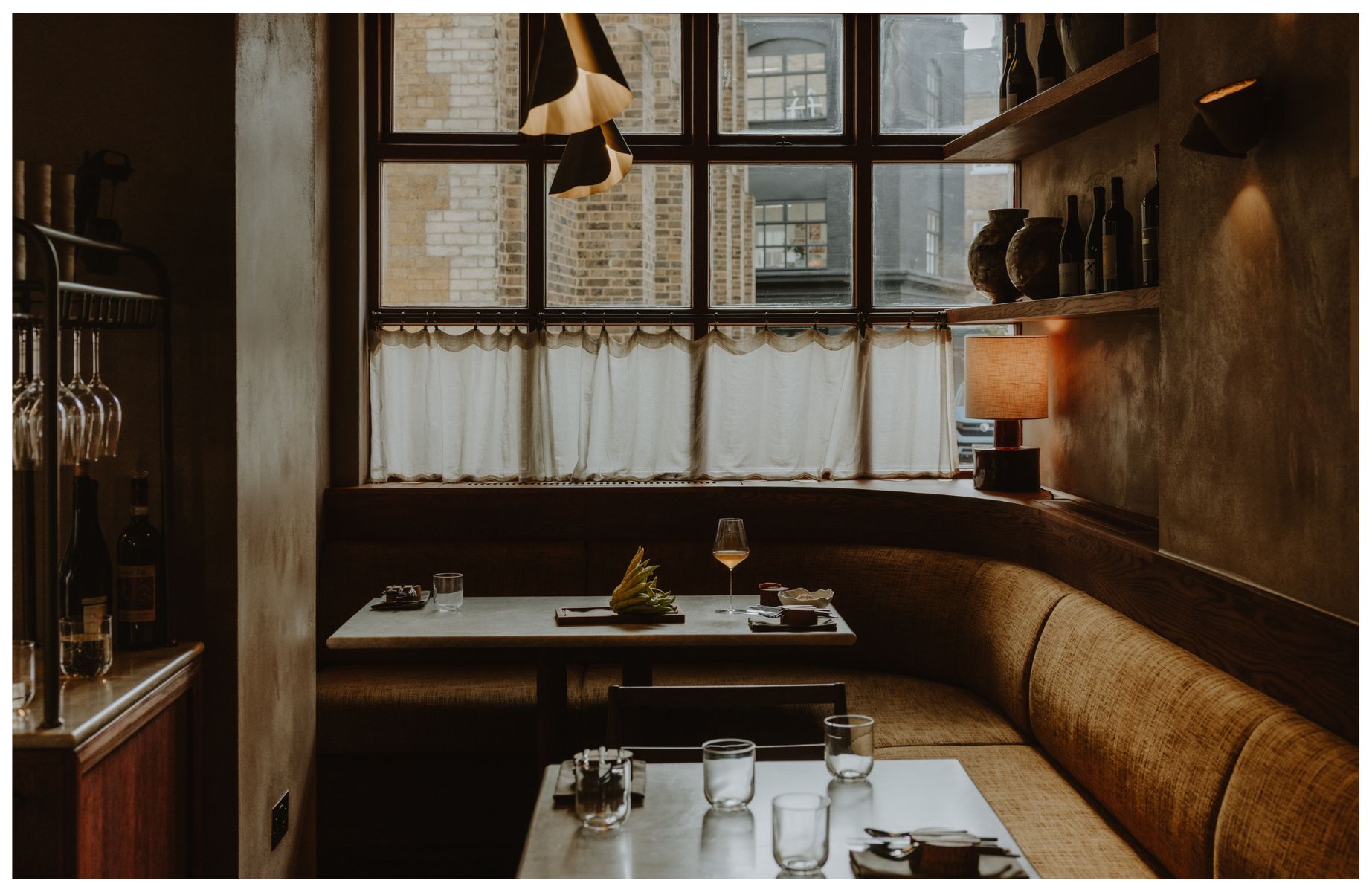 The serene dining room at Plates London, with industrial Shoreditch outside. © Joanna Yee/The MICHELIN Guide