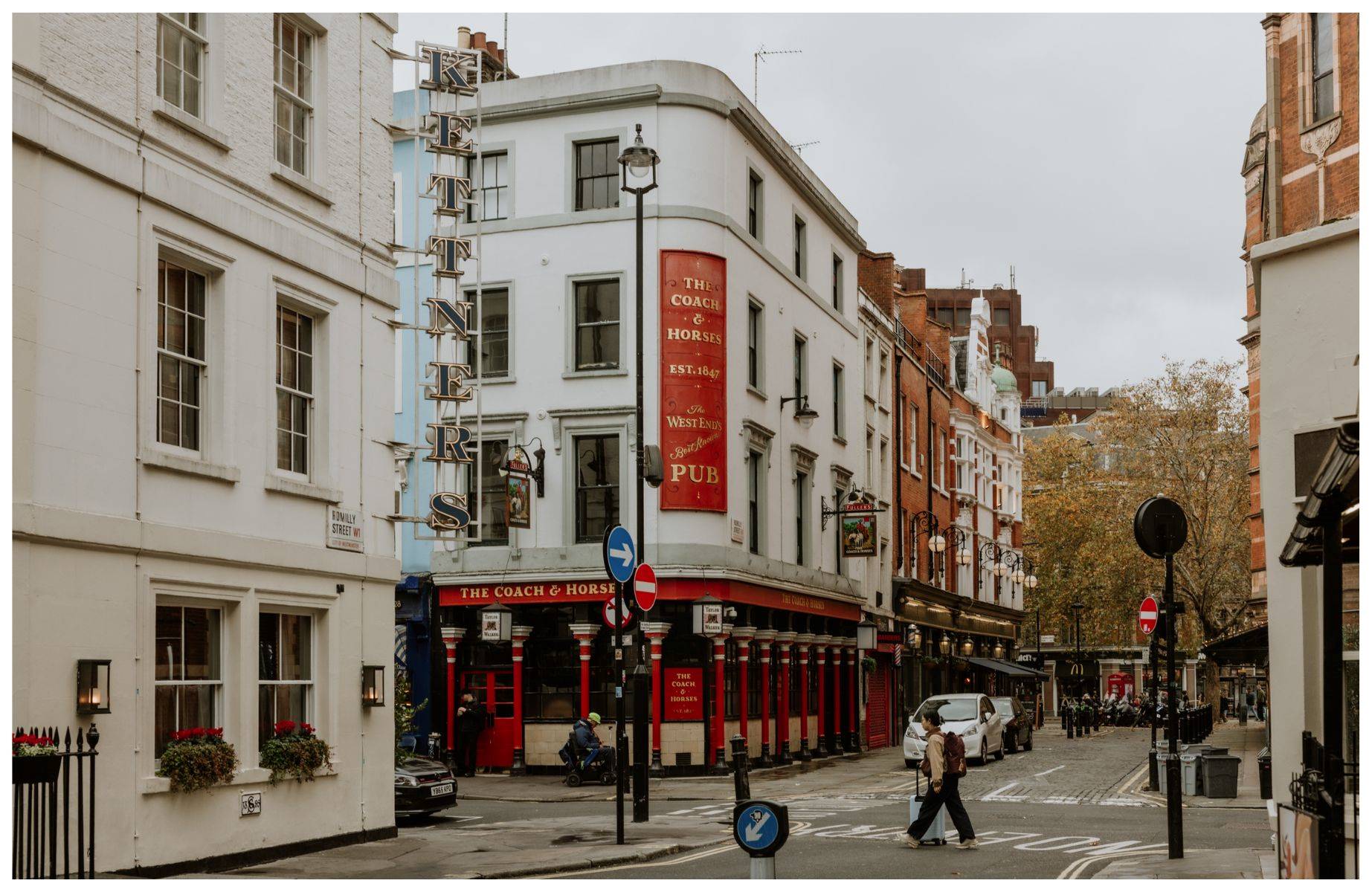 A Soho street scene, featuring The Coach & Horses pub and Kettner's hotel. © Joanna Yee/The MICHELIN Guide
