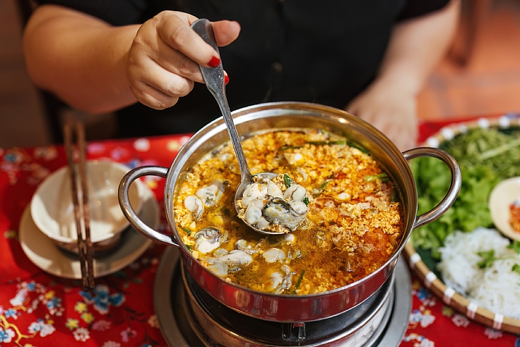 The umami hotpot at Nhà Tú in Ho Chi Minh City. (© Mervin Lee/The MICHELIN Guide Vietnam)