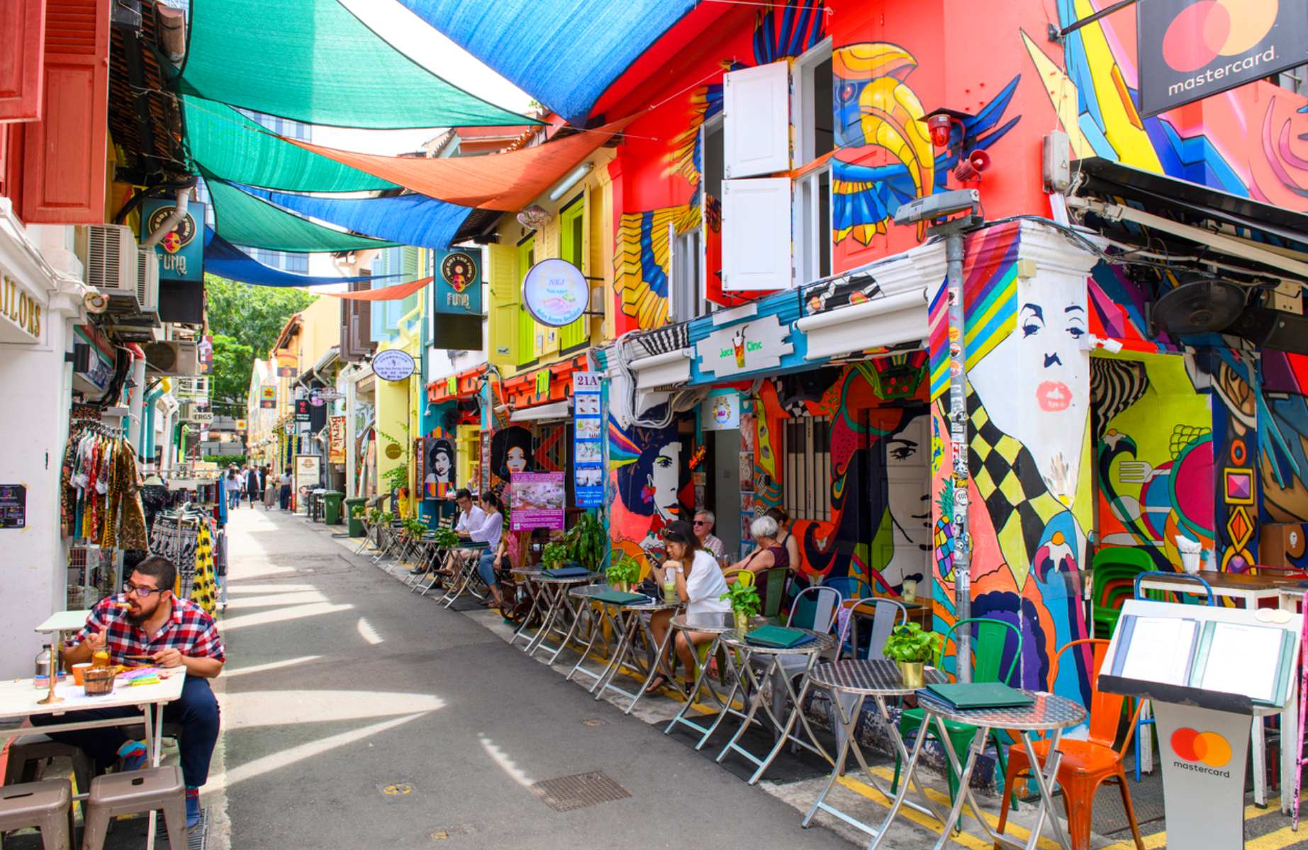 Haji Lane is Singapore’s colorful alley of indie shops, street art and hidden cafés. © Brostock/iStock