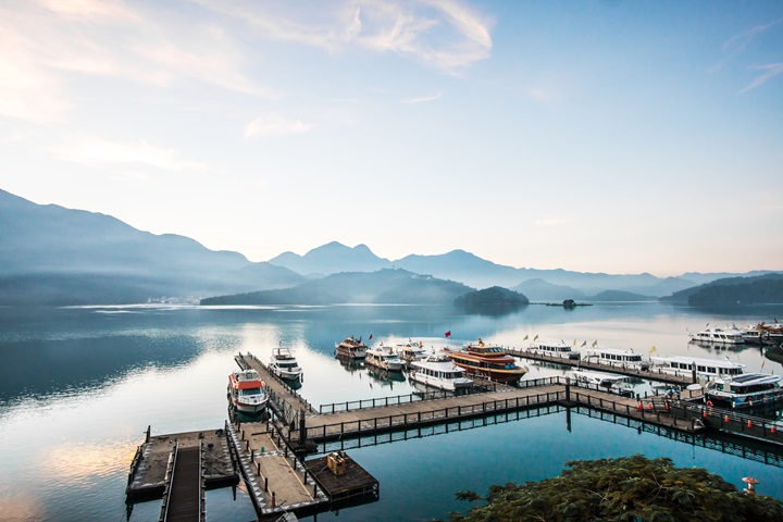 Beat the summer heat at Sun Moon Lake, where misty mornings, cool breezes, and tranquil waters promise a serene escape. ©Shutterstock