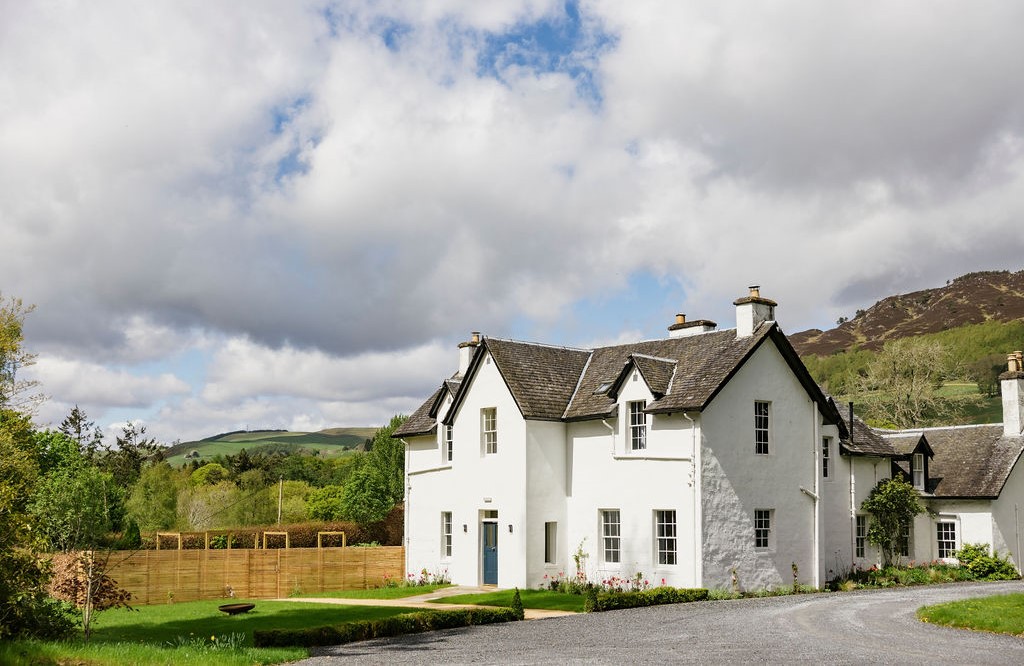 The whitewashed house itself, surrounded by serene countryside. © Alex Baxter/Killiecrankie House