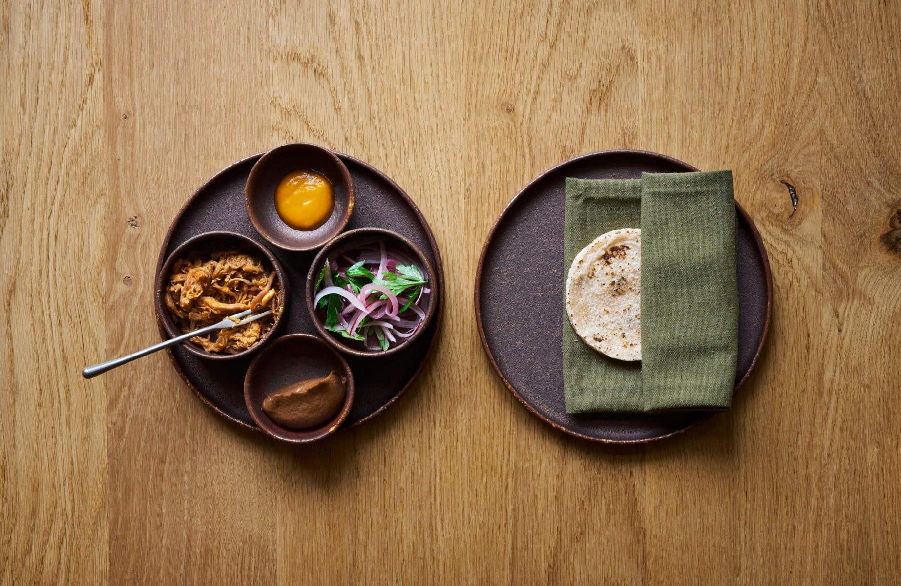 Bread and condiments from Maré by Rafael Cagali, the first MICHELIN Star in Brighton and Hove for nearly 50 years. © David Charbit/Maré by Rafael Cagali