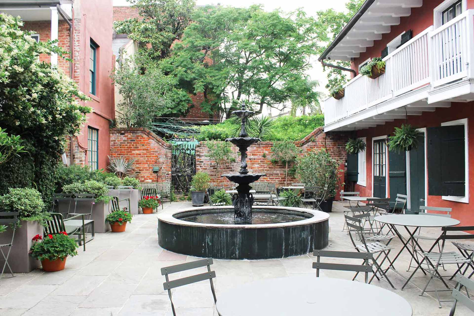 The historic outdoor courtyard behind the Celestine. © Peychaud's/The Celestine