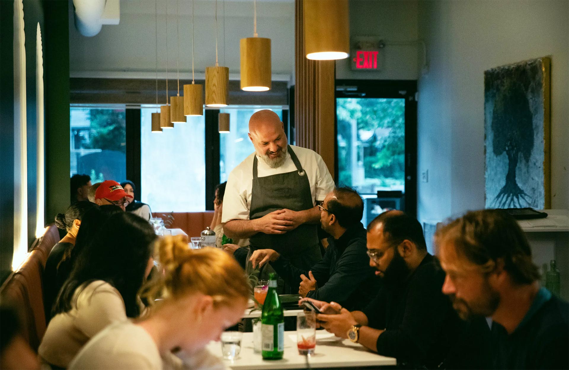 Chef/owner Moeen Abuzaid creates a welcoming environment at his restaurant. © Queena Liu/Arbequina