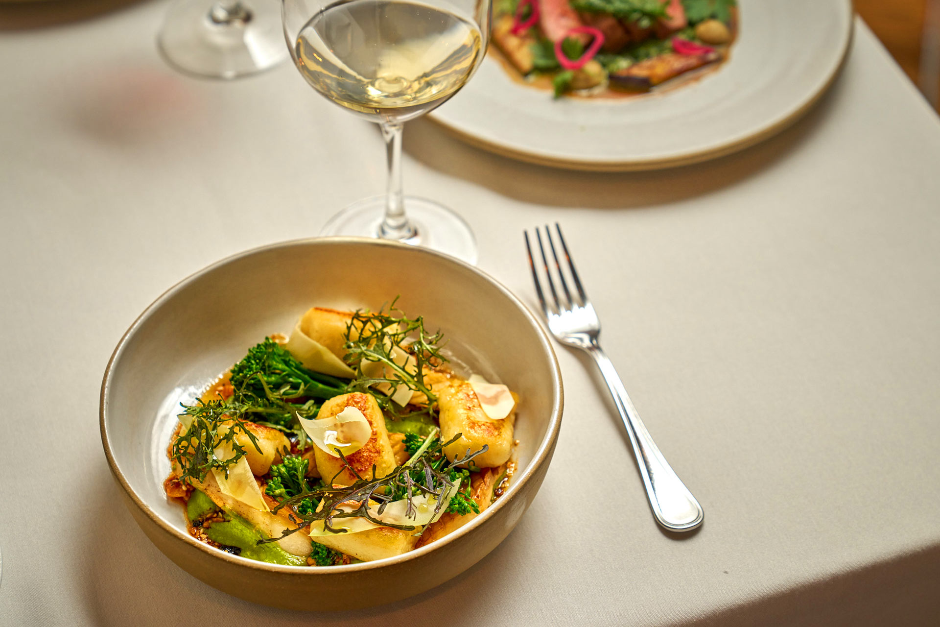 Hay-smoked gnocchi is one of Chef Ettarh's signature dishes. © Francesco Sapienza/Gramercy Tavern