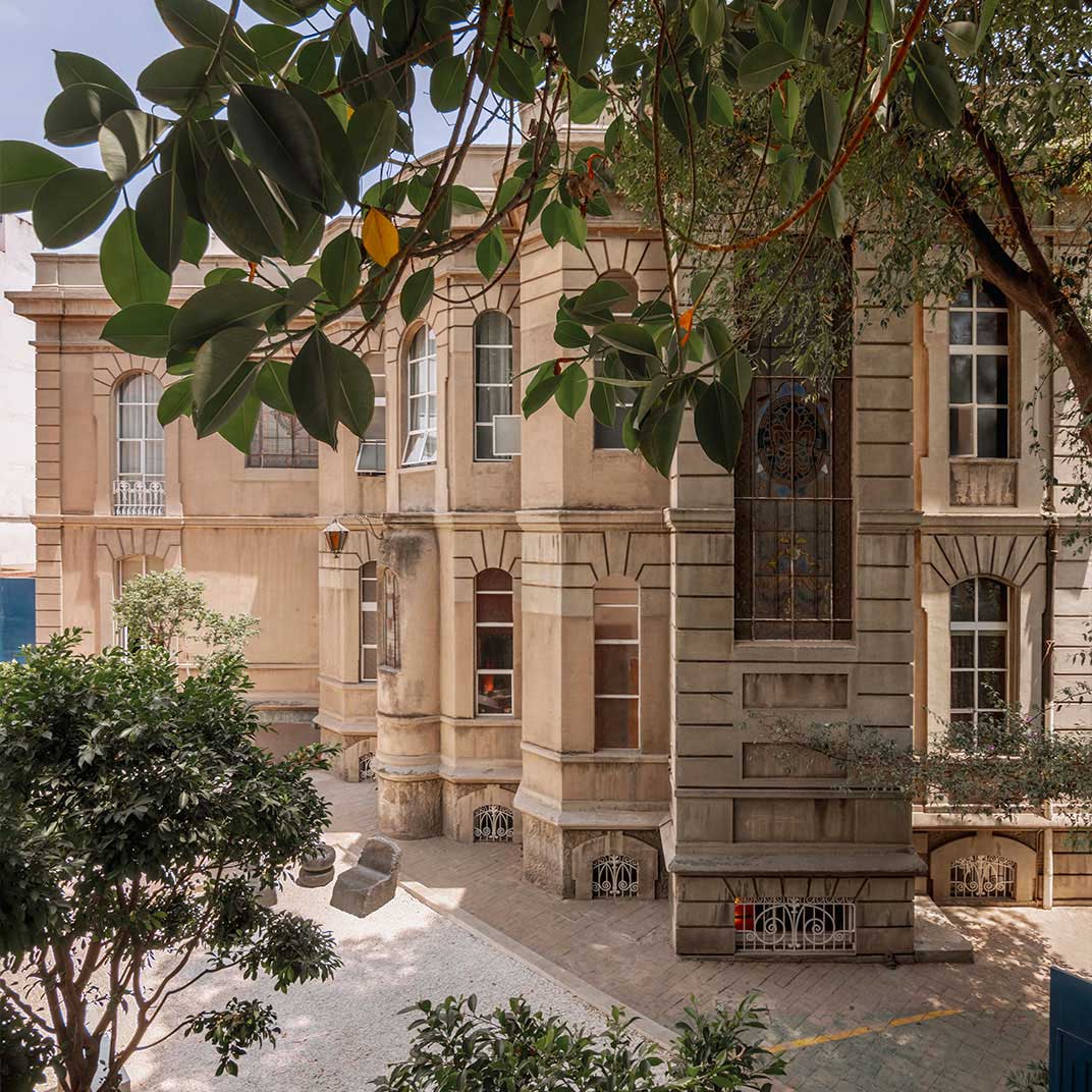 The historic exterior of Maison Celeste, a One-Key restored mansion in the neighborhood of Roma. © Maison Celeste