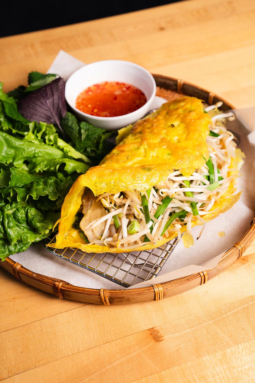 Bánh Xèo, or sizzling crepe, is a Vietnamese favorite. ©Kristen Mendiola/HaiSous Vietnamese Kitchen