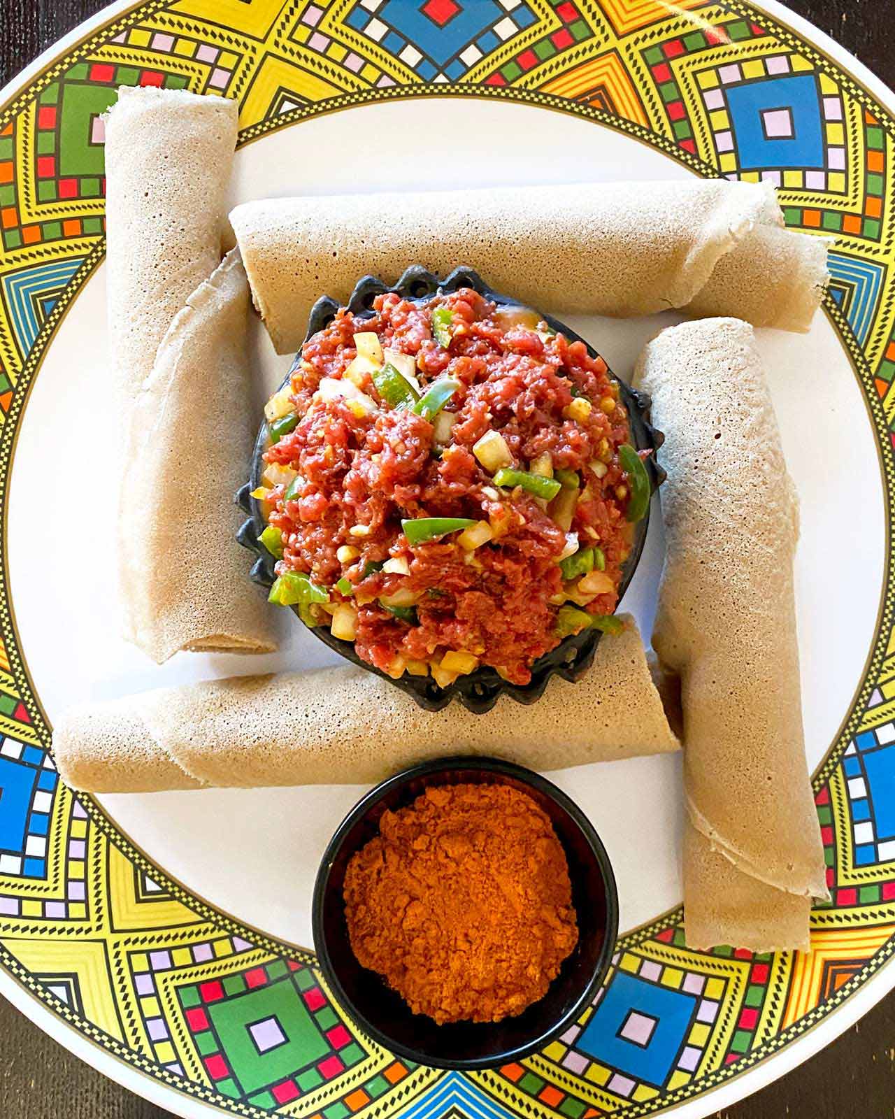 Injera's spongy consistency makes it ideal for sopping up sauce. © Frey T/Lalibela