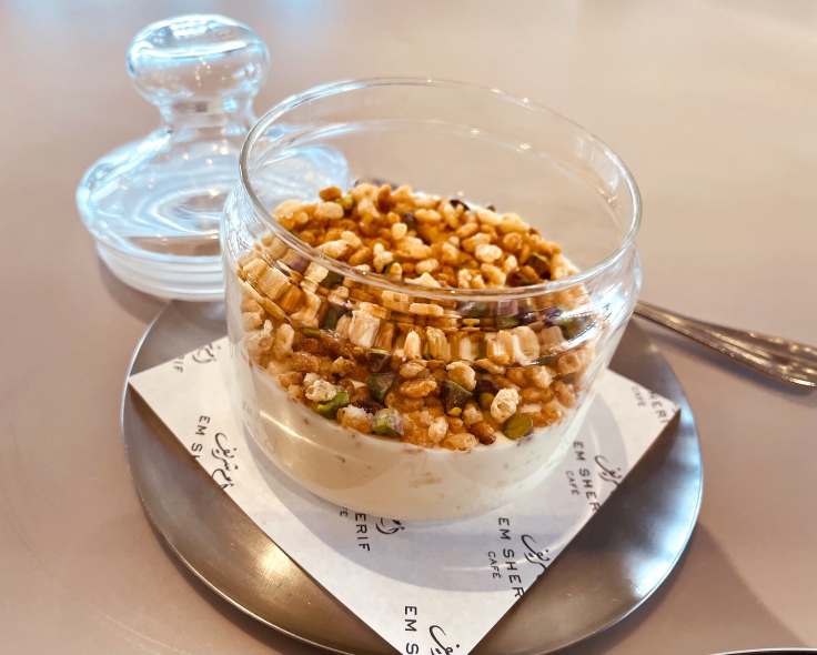 A traditional Lebanese dessert, 'riz bi halib' aka 'rice in milk' at Em Sherif Cafe with puffed rice crisps. © Michelin