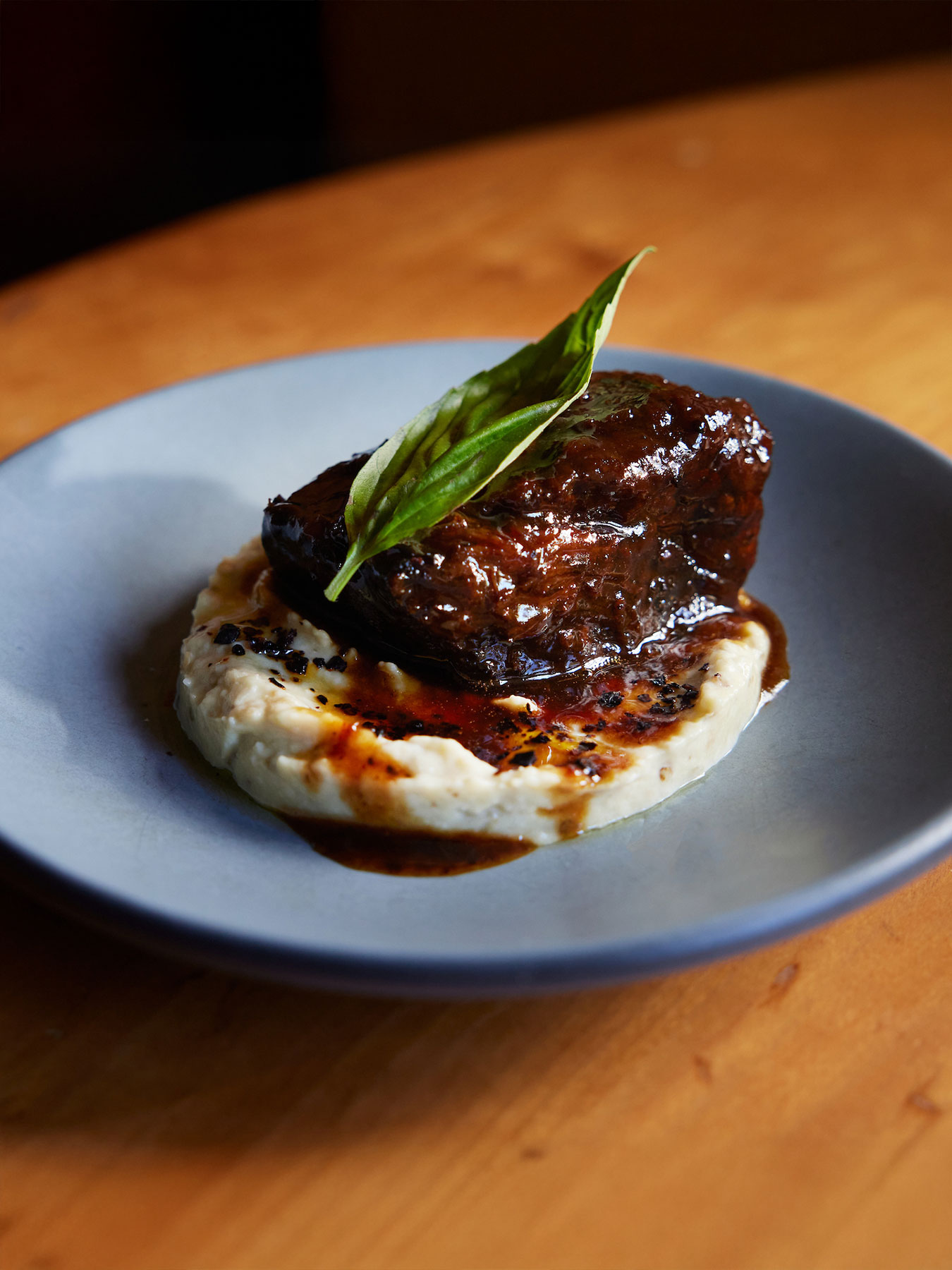 Oleana's "Sultan’s Delight" comprises tamarind beef, smoky eggplant purée and basil. © Kristin Teig/Oleana