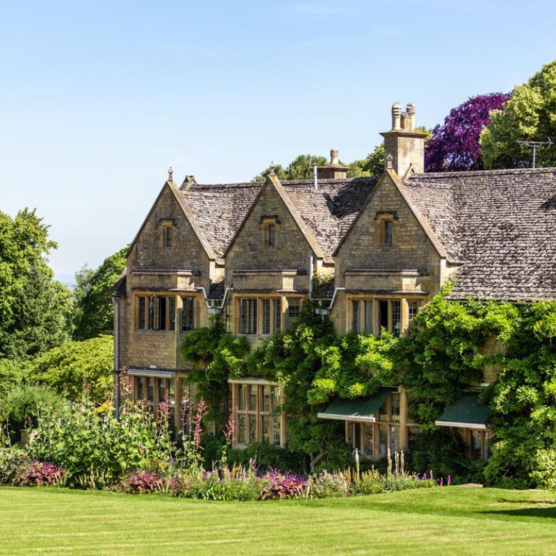 Buckland Manor's classic Cotswoldian exterior and verdant surroundings. © Buckland Manor