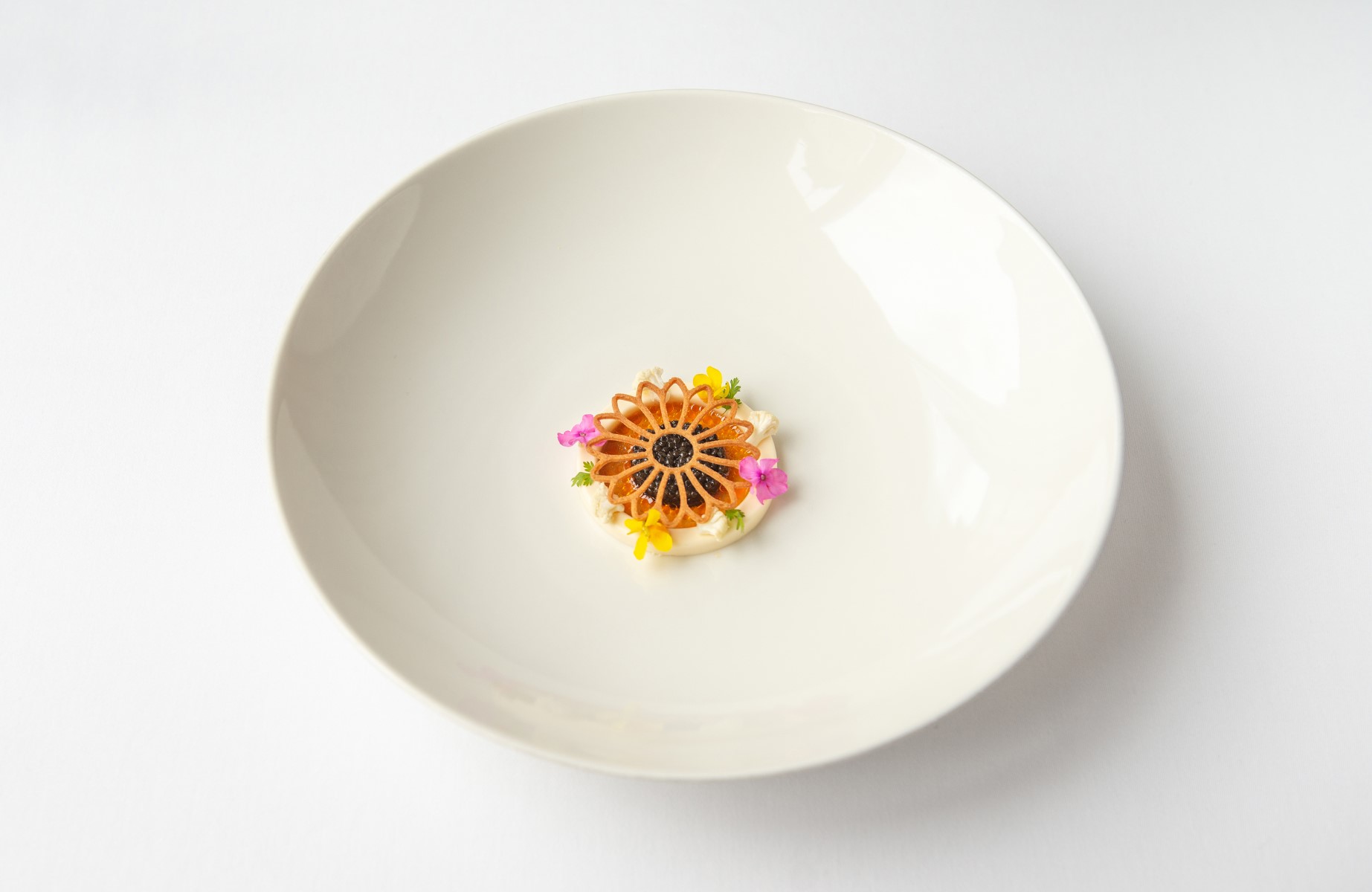 A beautifully crafted dish from Muga in Poznań, another of our existing MICHELIN-Starred restaurants in Poland. © Małgorzata Opala/Muga