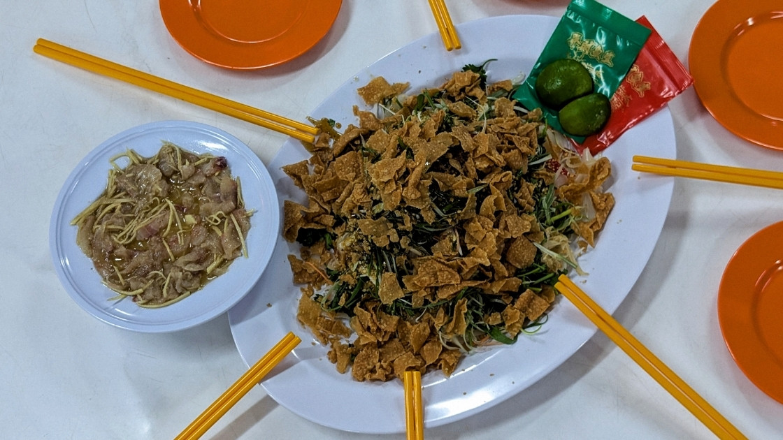 Yu sheng, or yee sang, as it's more commonly referred to in Kuala Lumpur, is an essential part of any Lunar New Year meal. © Ethan Lau