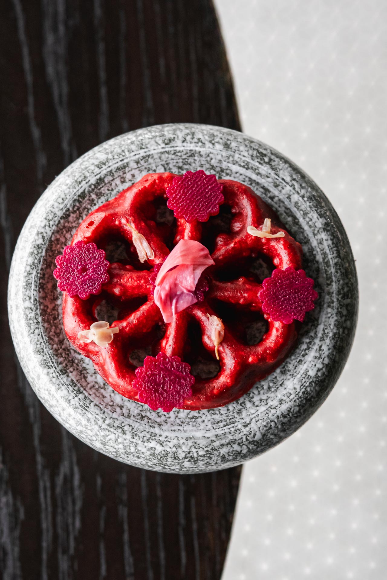 Beetroot rosette with preserved flowers and brunost. © Published on Main