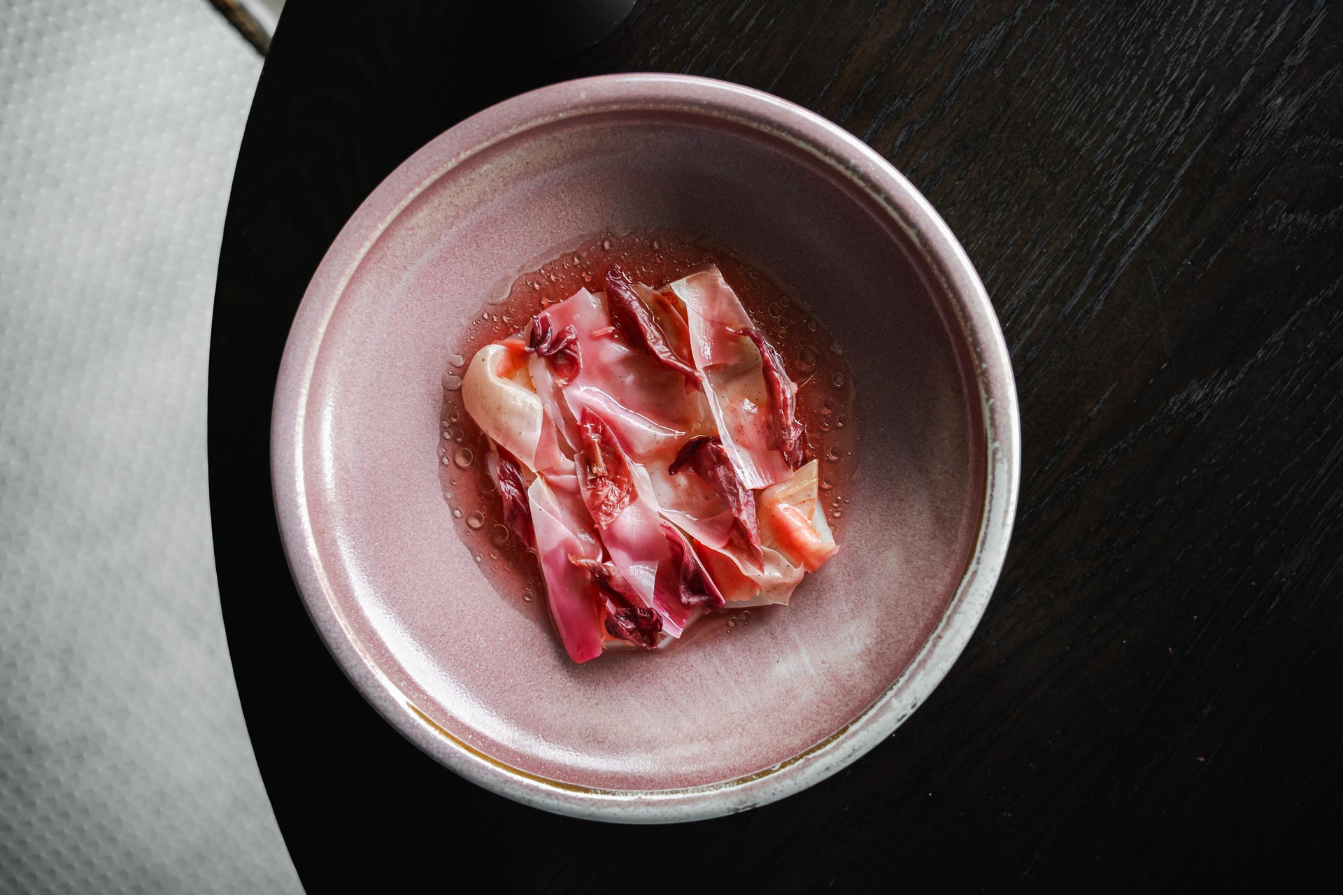 Scallop with pickled magnolia, rhubarb ponzu and koji has a delightful rosy hue. © Published on Main