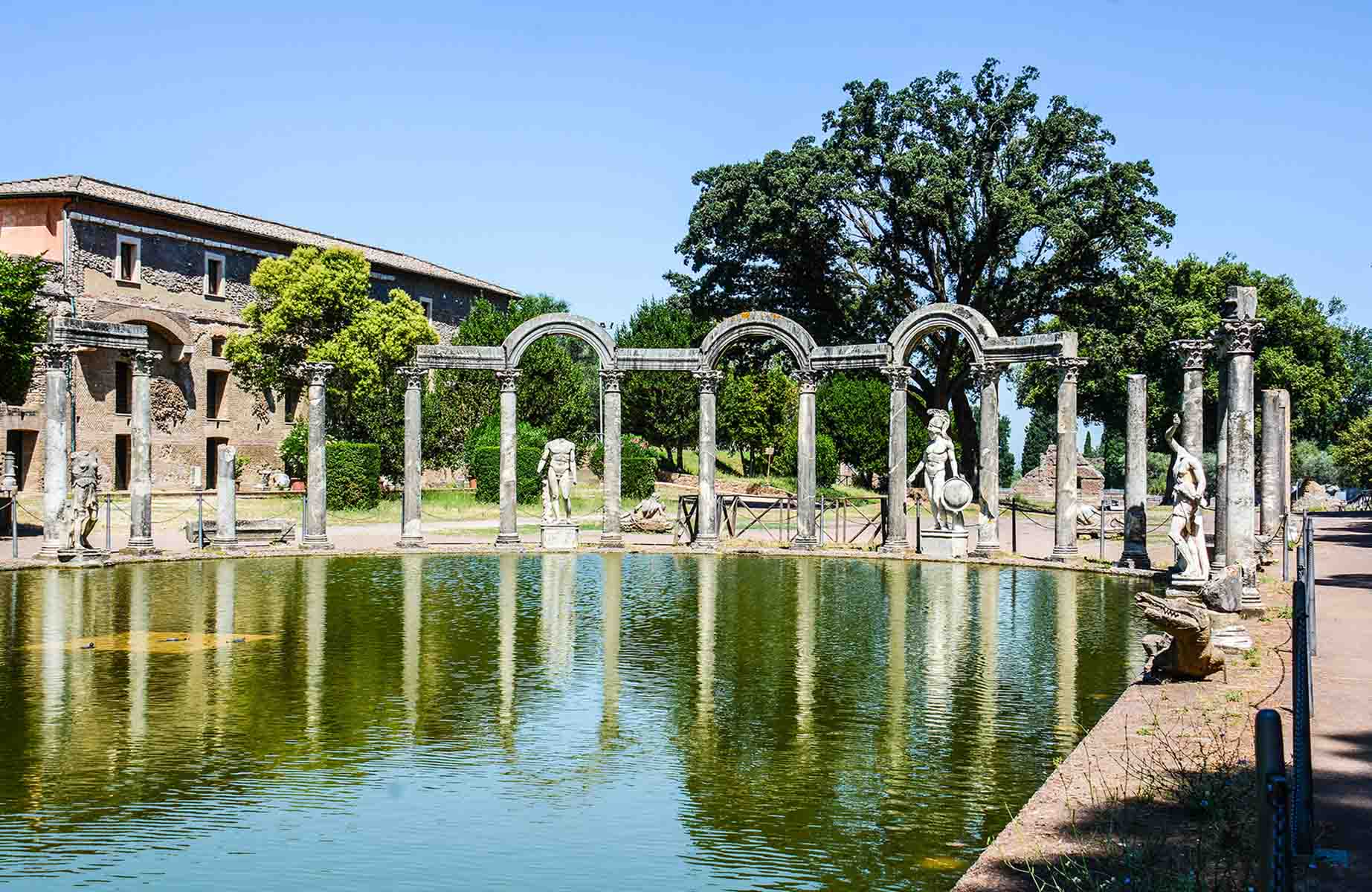 Take in the ancient "Canopus" pool at Hadrian's Villa in the town of Tivoli, one of our recommended day trips from Rome. © wizgeoffrey/iStock