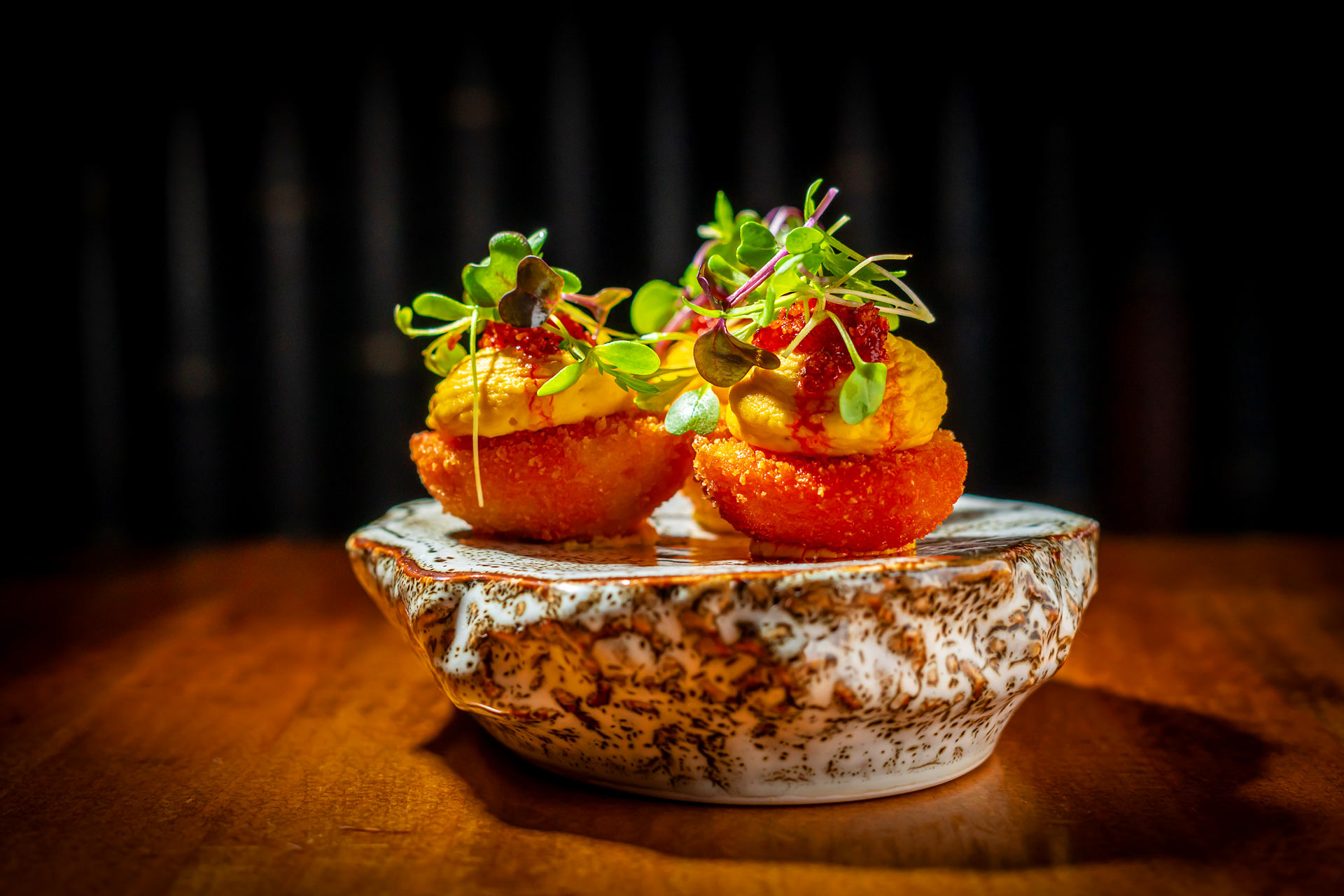 Hot crispy egg whites and creamy yolks make the Tuome deviled egg a must try. © Noah Fecks/Tuome