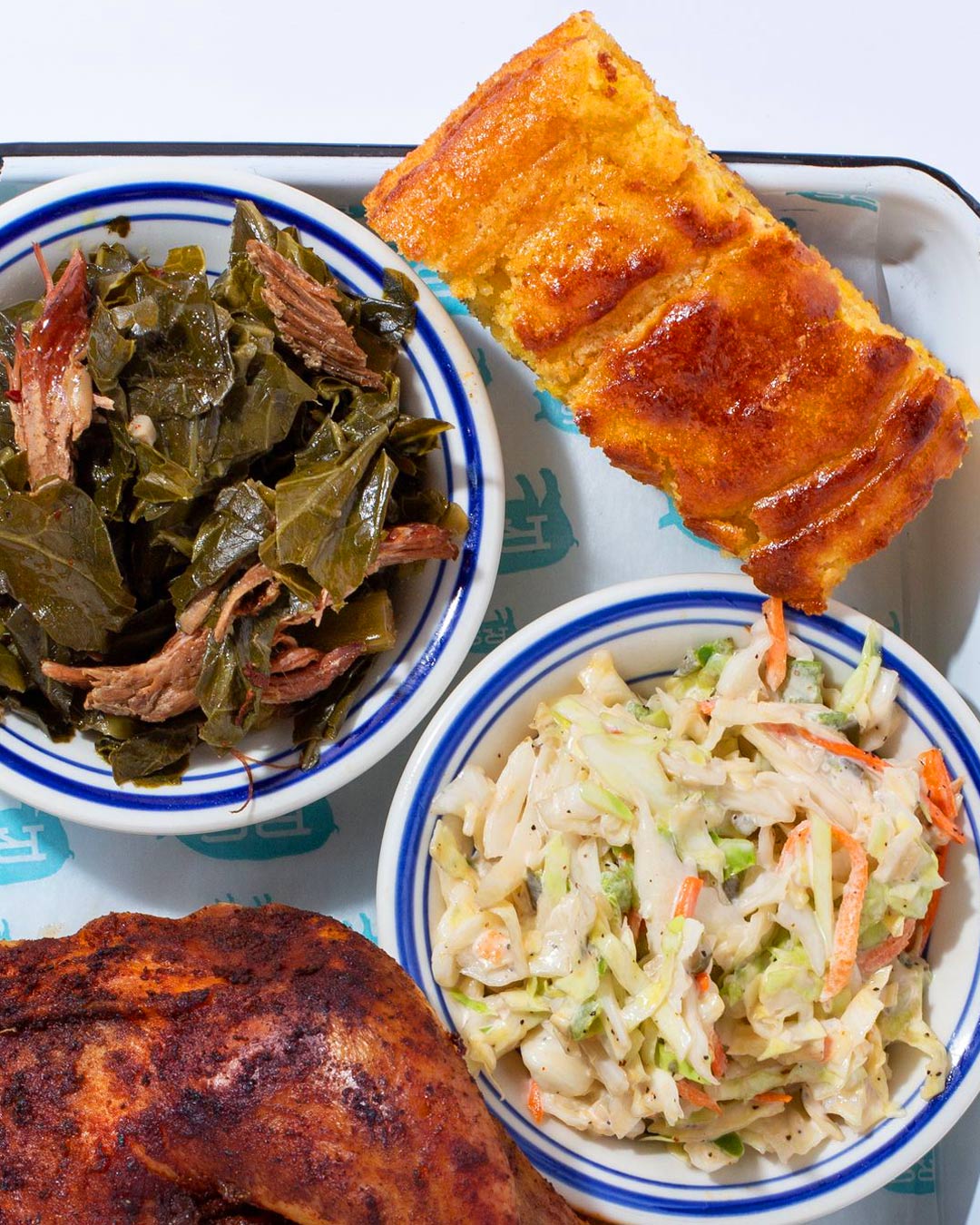  Light and fluffy pan-style cornbread loaves provide a nice counterbalance to the smoked meats and hearty sides at Rodney Scott's. © Angie Mosier/Rodney Scott's BBQ