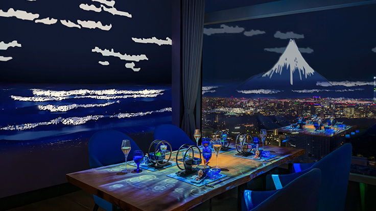 Projection mapping has become a signature of the hotel's experience — deployed with equal effect in the guest rooms and at the table.© The Prince Gallery Tokyo Kioicho