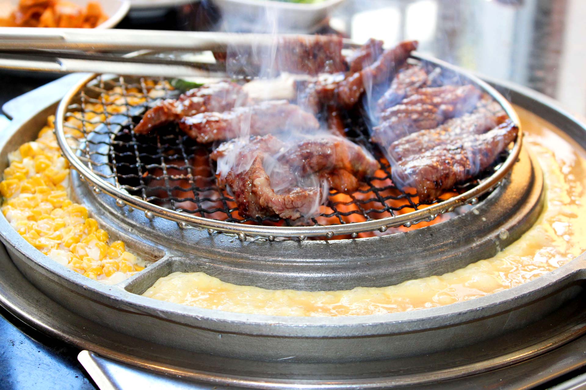 A tabletop grill at Korean barbecue spot, Han Il Kwan. © Victoria Yi/Han Il Kwan