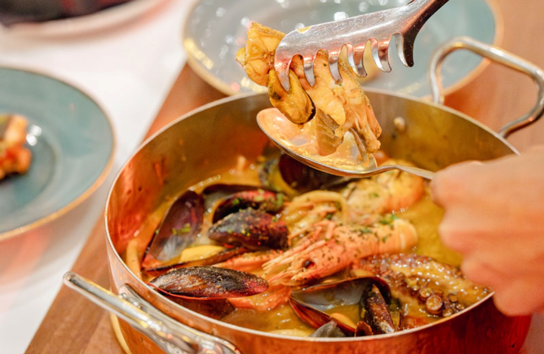Brodetto with white wine, langoustines, octopus, mussels and fish. © Kadena