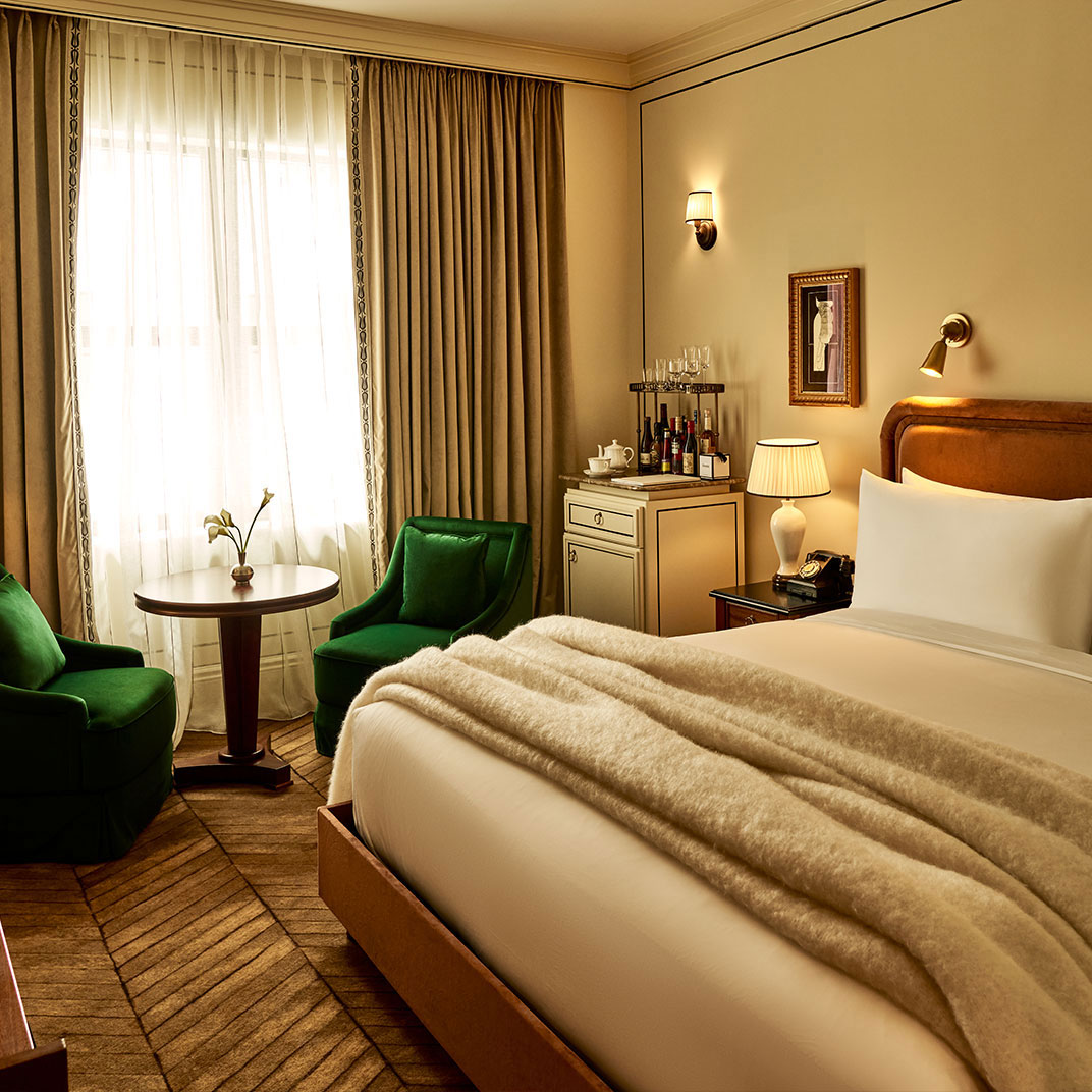 At the Twenty Two, rooms hide little period touches like working rotary phones and retro light fittings for throwback flair. © Twenty Twenty Two