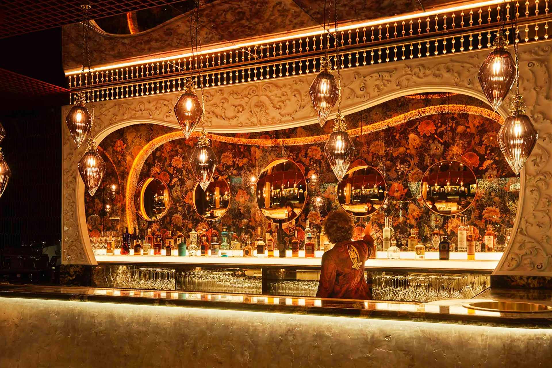 Plush velvet furnishings and gilt features lead the way at the elegant Thirteen bar. © Chateau Denmark London