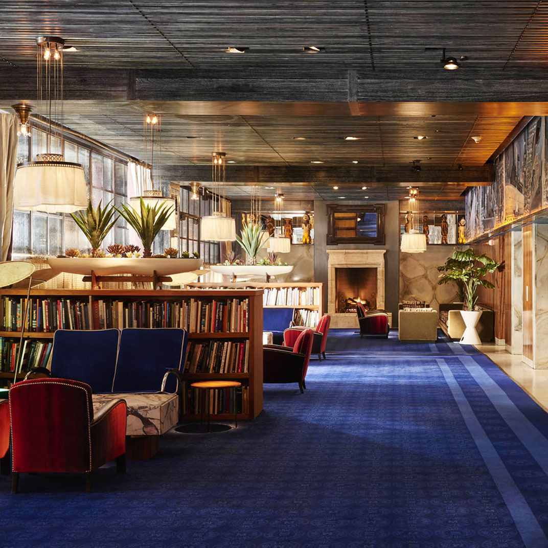 Cozy up in front of the fireplace with a borrowed book and up to two furry friends at no added surcharge, no matter their size. © The Maritime Hotel