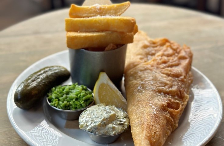 Possibly the most famous of all British dishes, fish & chips, from The Bull & Last pub. © The Bull & Last
