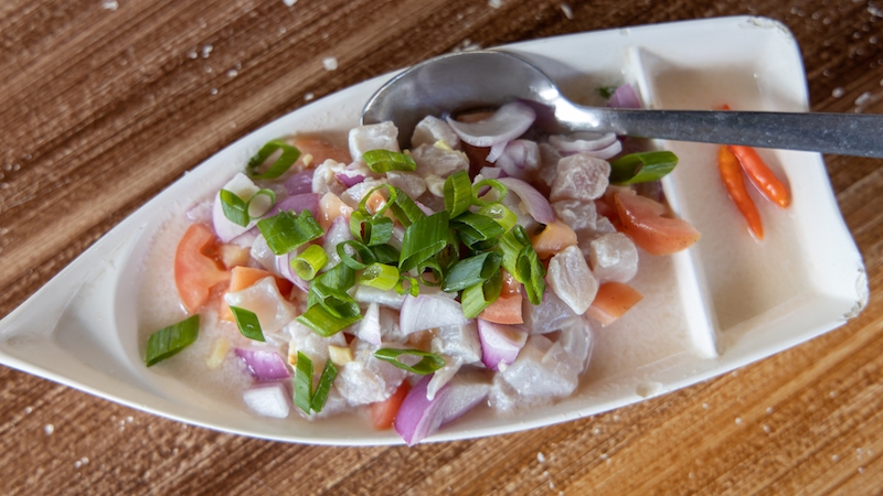 Kinilaw is a Filipino dish of raw seafood gently “cooked” in vinegar, sharpened with ginger, chilies and aromatics for a bright, clean heat. © Kim David