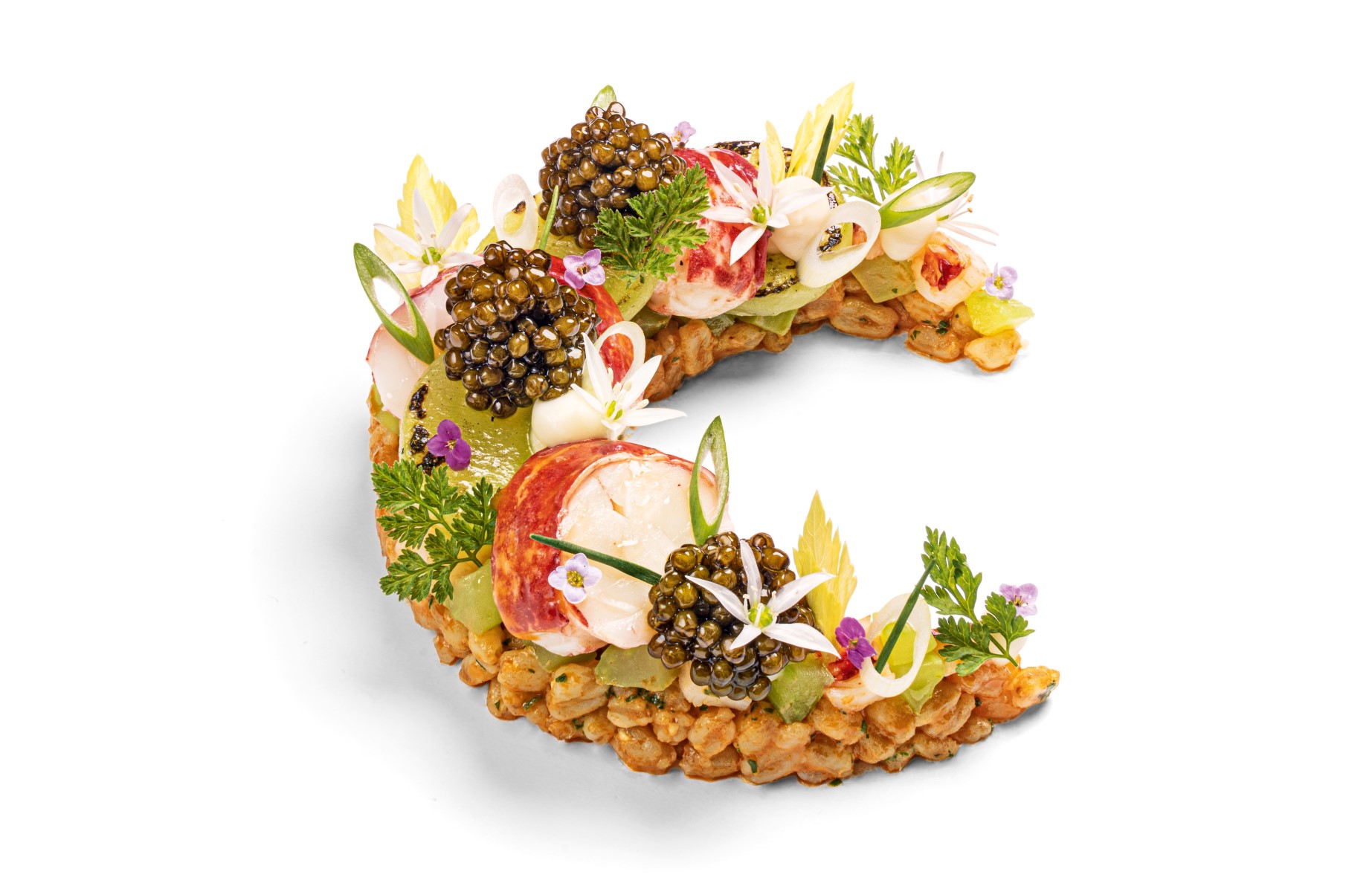 A playfully presented dish of lobster and spelt from the CORE kitchen. © WeTheFoodSnobs/CORE by Clare Smyth