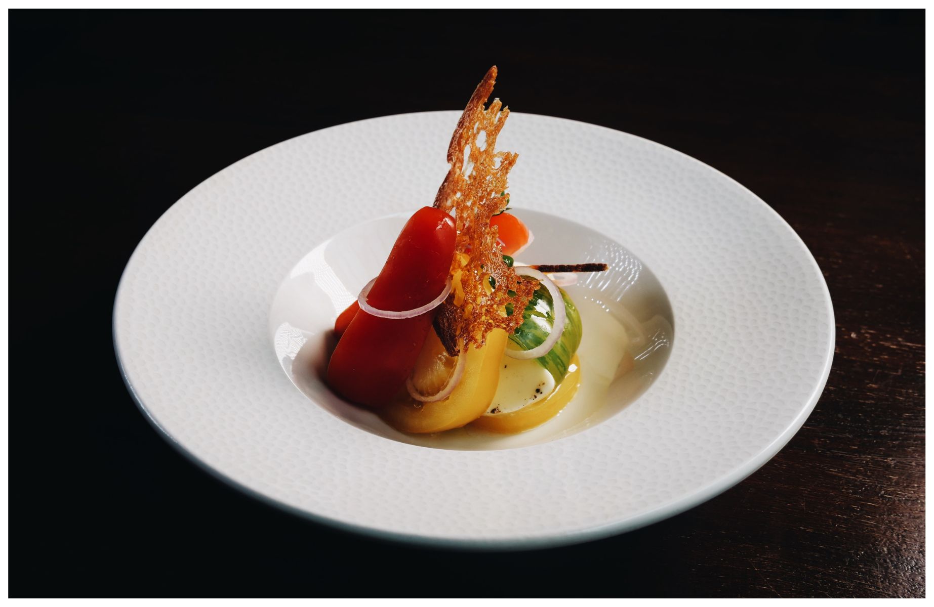 Artfully presented tomato and mozzarella from the EDŌ kitchen. © Ellie McDowell/EDŌ