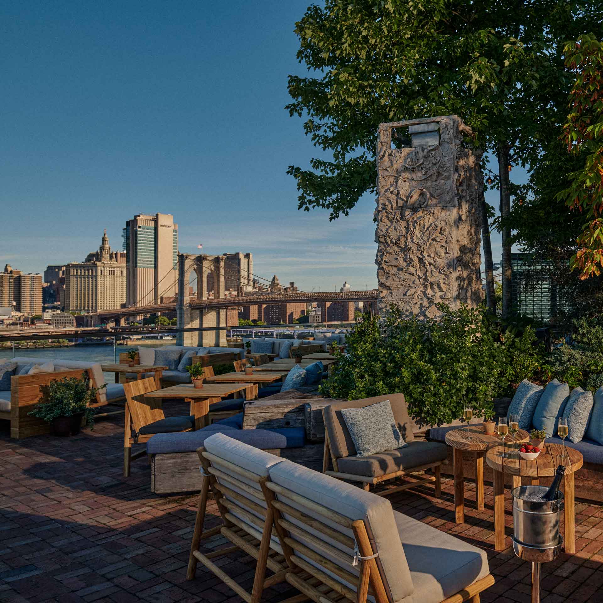 A waterside lounge space at 1 Hotel Brooklyn Bridge. © Ashley Sears
