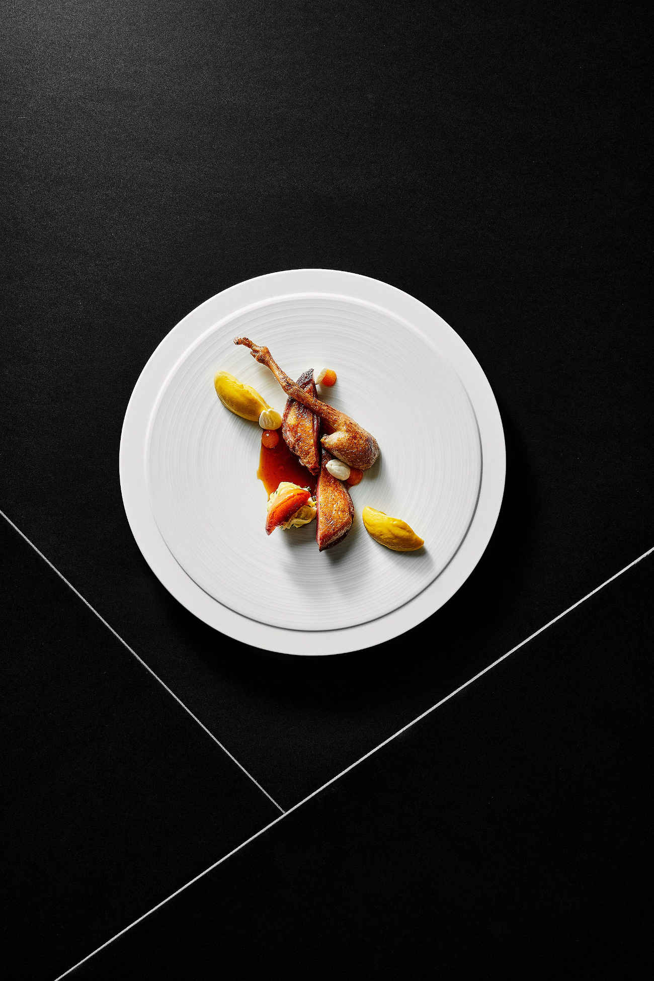 Curtis Maquet aime les cuissons classiques, comme dans cette préparation de pigeon. © Antoine Melis
