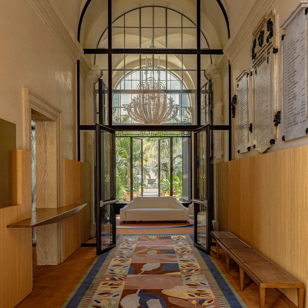 An entryway at Palazzo Talìa, where swanky interiors owe their glamor to filmmaker Luca Guadagnino. © Palazzo Talìa