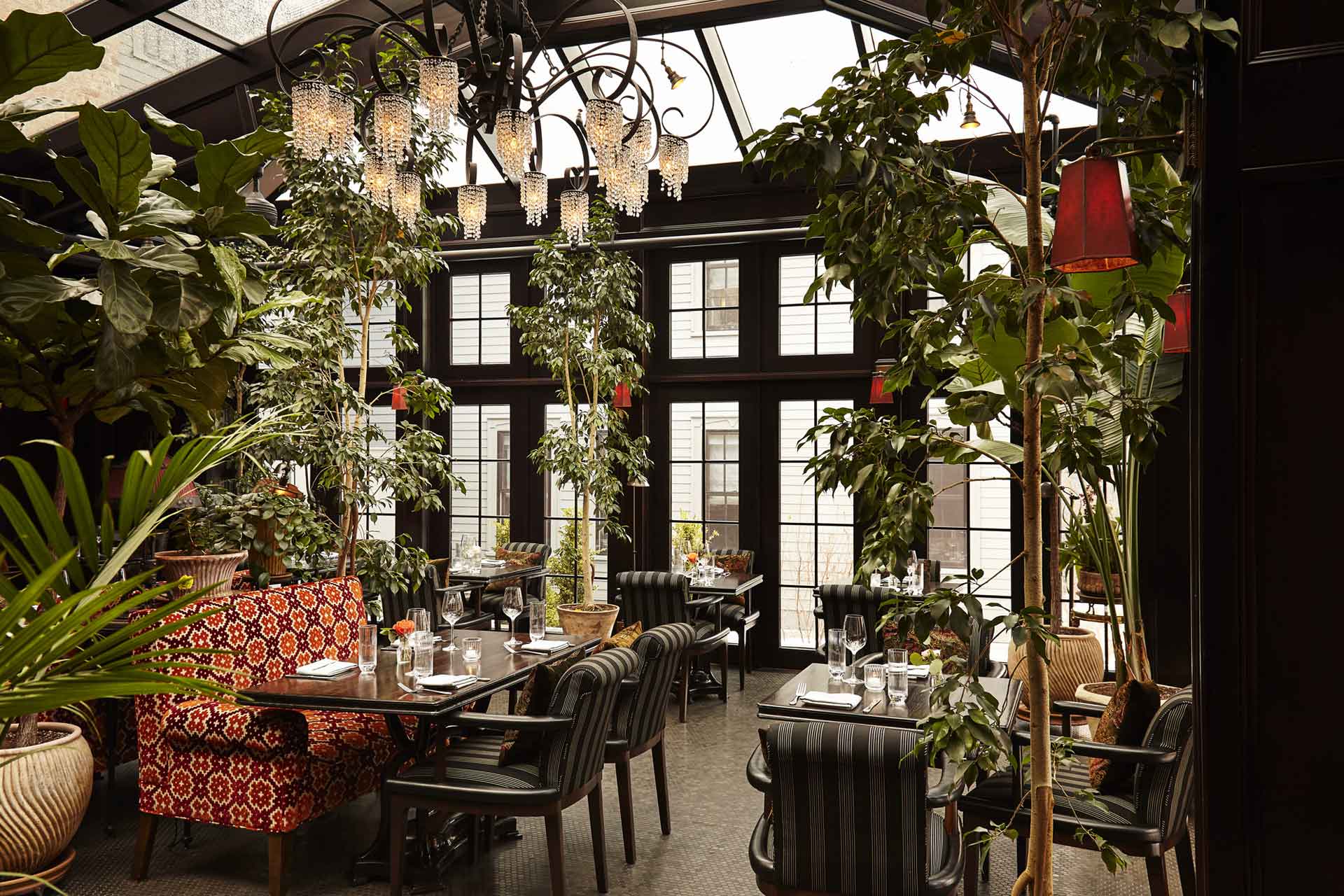 A glass conservatory hosts the Maker's seasonal on-site restaurant. © Francine Zaslow, the Maker