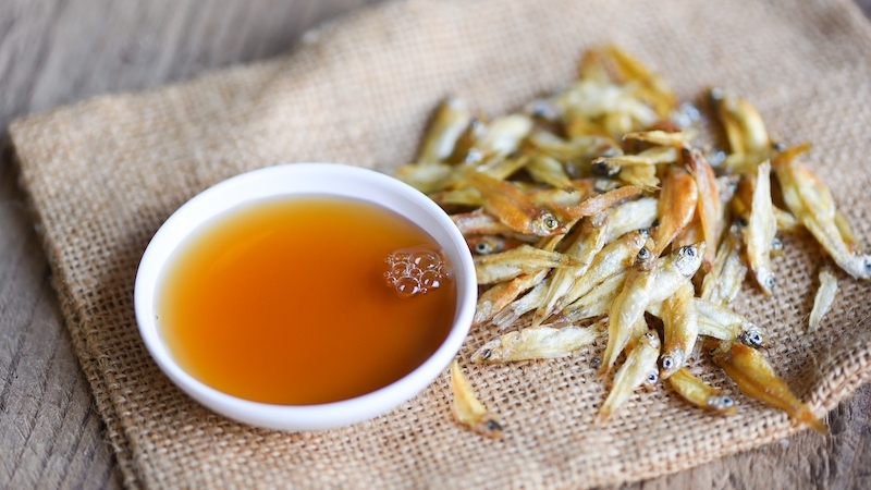 Born from fermented fish and salt, patis became the Philippines’ answer to umami — a sharp, amber fish sauce stirred into tinola and pinakbet, or splashed over grilled food and broth when a dish needs deepening. © BIGC Studio