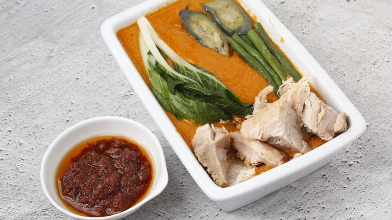No bowl of kare-kare feels complete without bagoong — the pungent fermented shrimp or fish paste that cuts through the richness of the peanut sauce with a deep, salty funk Filipinos have loved for centuries. © Jun Pinzon