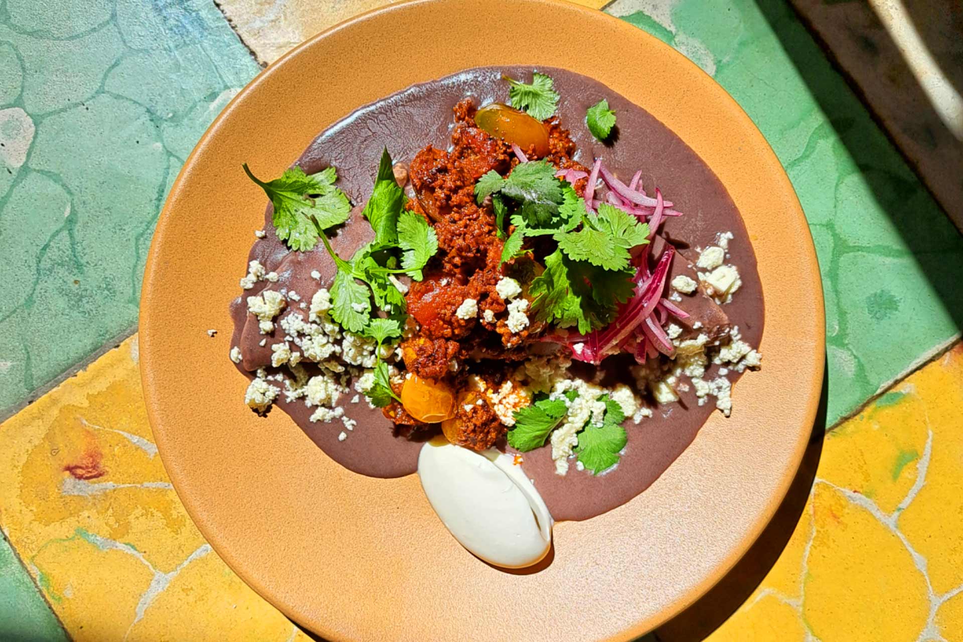 Valdés' favorite breakfast, enfrijoladas. © Josue Puch/Pancho Maiz