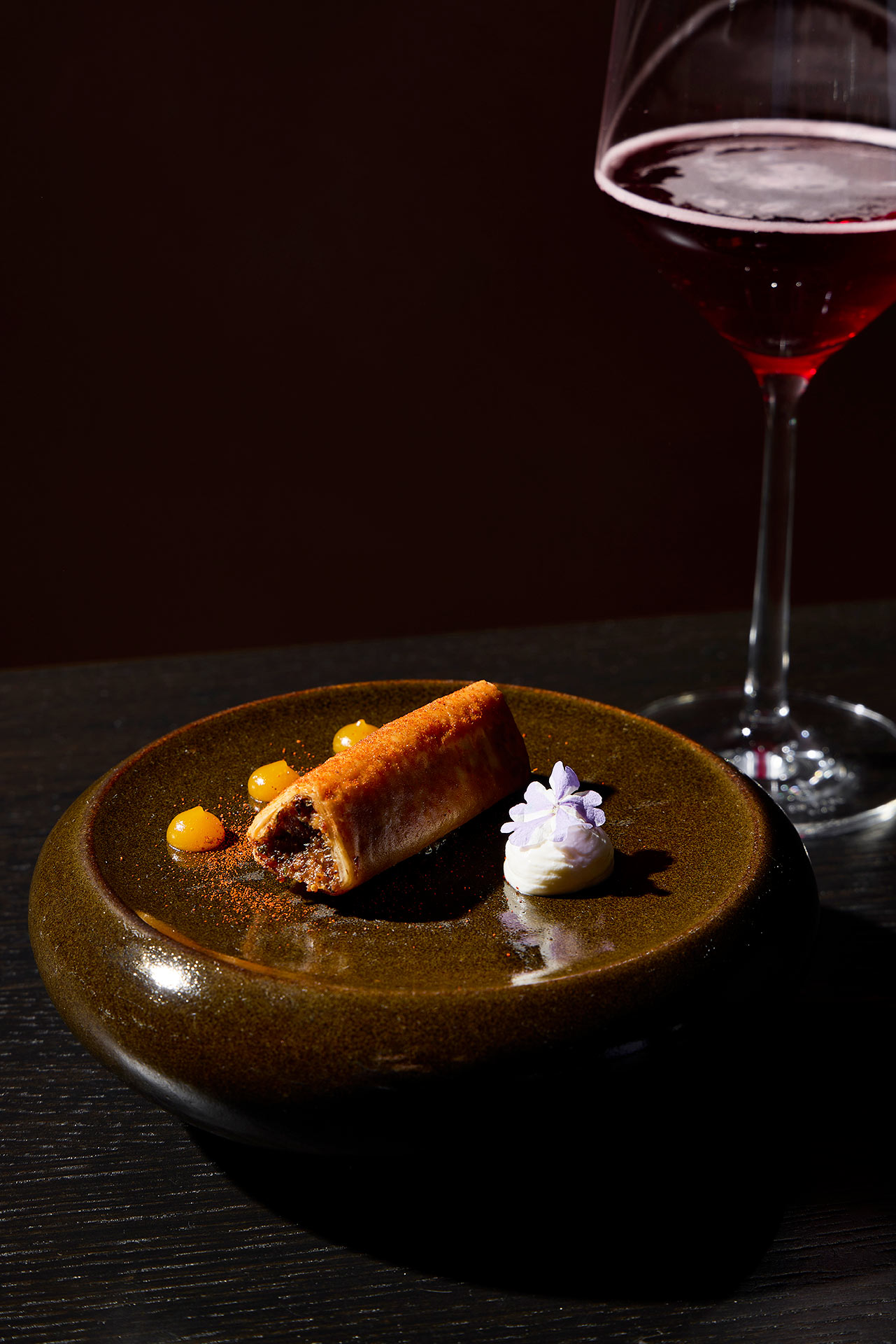  Lamb Börek with foraged mushrooms and apricot paired with Moody Tongue's Cassis. © Jordano Studio/Moody Tongue