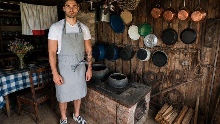 Arnas Petronis in the original barn at his grandmother’s house. © B’ARN Bistro