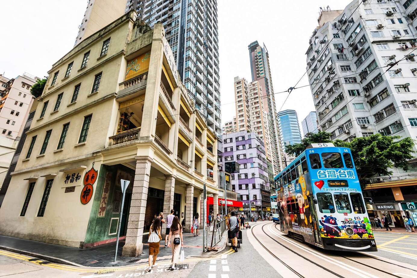 Woo Cheong Pawn Shop sits on a Johnston Road corner in Wan Chai, one of the few remaining tong lau buildings in Hong Kong. © Shutterstock