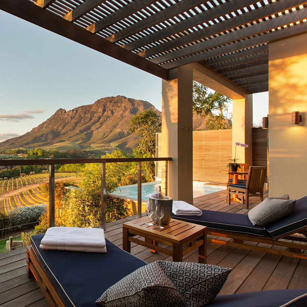 South Africa’s historic wine region sits just beyond your personal plunge pool. © Delaire Graff Lodges & Spa 