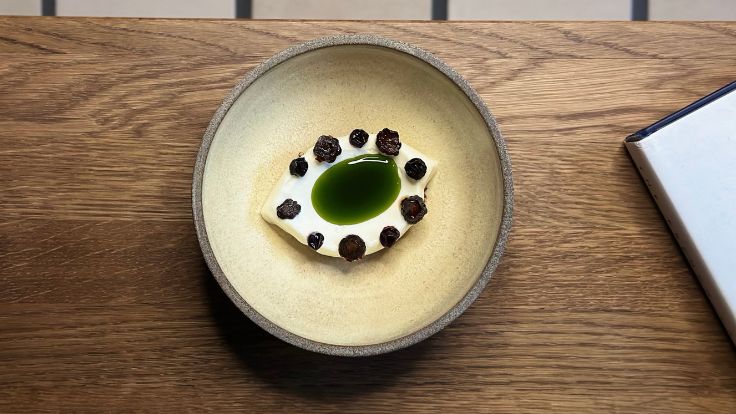 A dish of meadowsweet, buckwheat and pine cones from the Spring menu. © Boreal