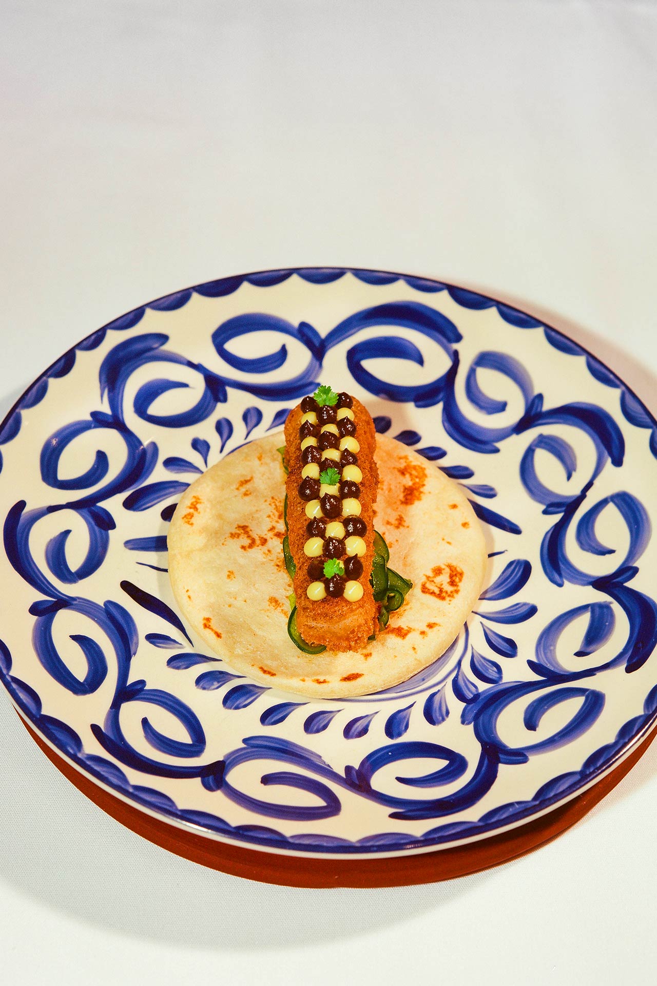 The beautifully constructed fish taco. © Val Cantú/Californios