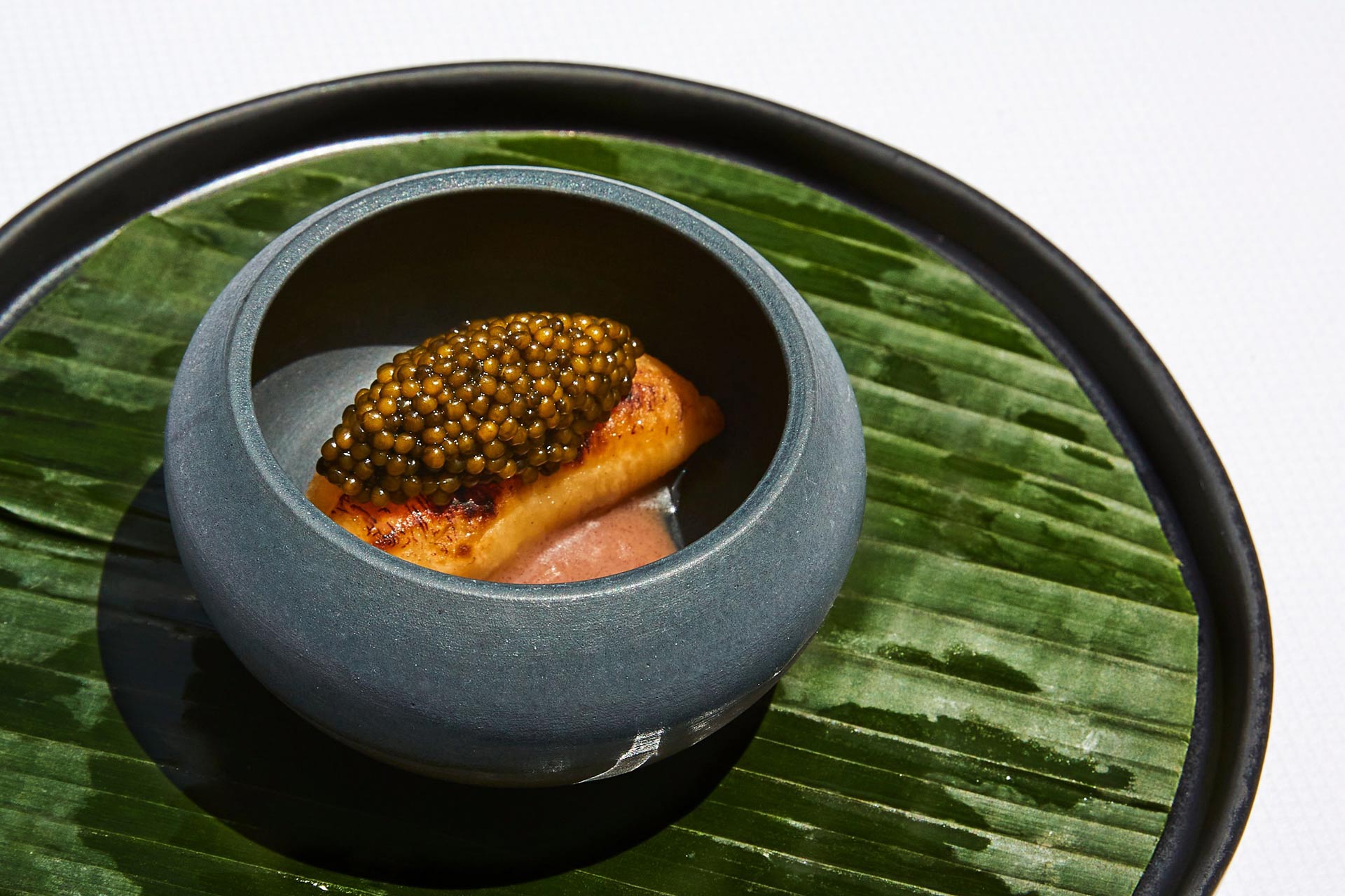 Grilled banana topped with caviar. © Casey Robinson/Californios