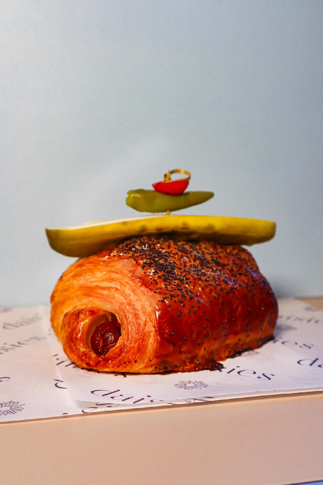 Daisie's hot dog croissant, a mash-up with The Wiener's Circle, the city’s storied hot dog stand. © Daisie's