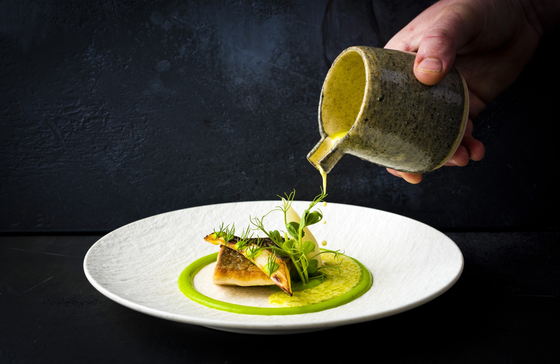The final touch being applied to one of Ryan Blackburn's dishes at Old Stamp House. © Bacon on the Beech/Old Stamp House